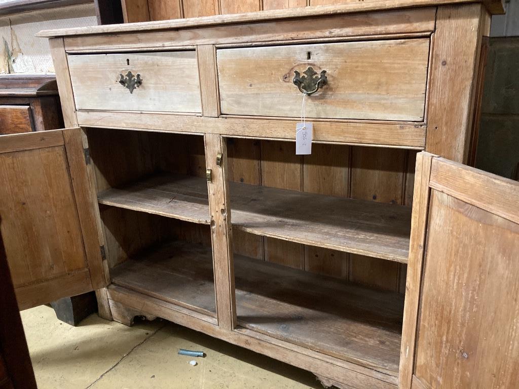 A Victorian pale pine kitchen dresser, length 124cm, depth 43cm, height 204cm